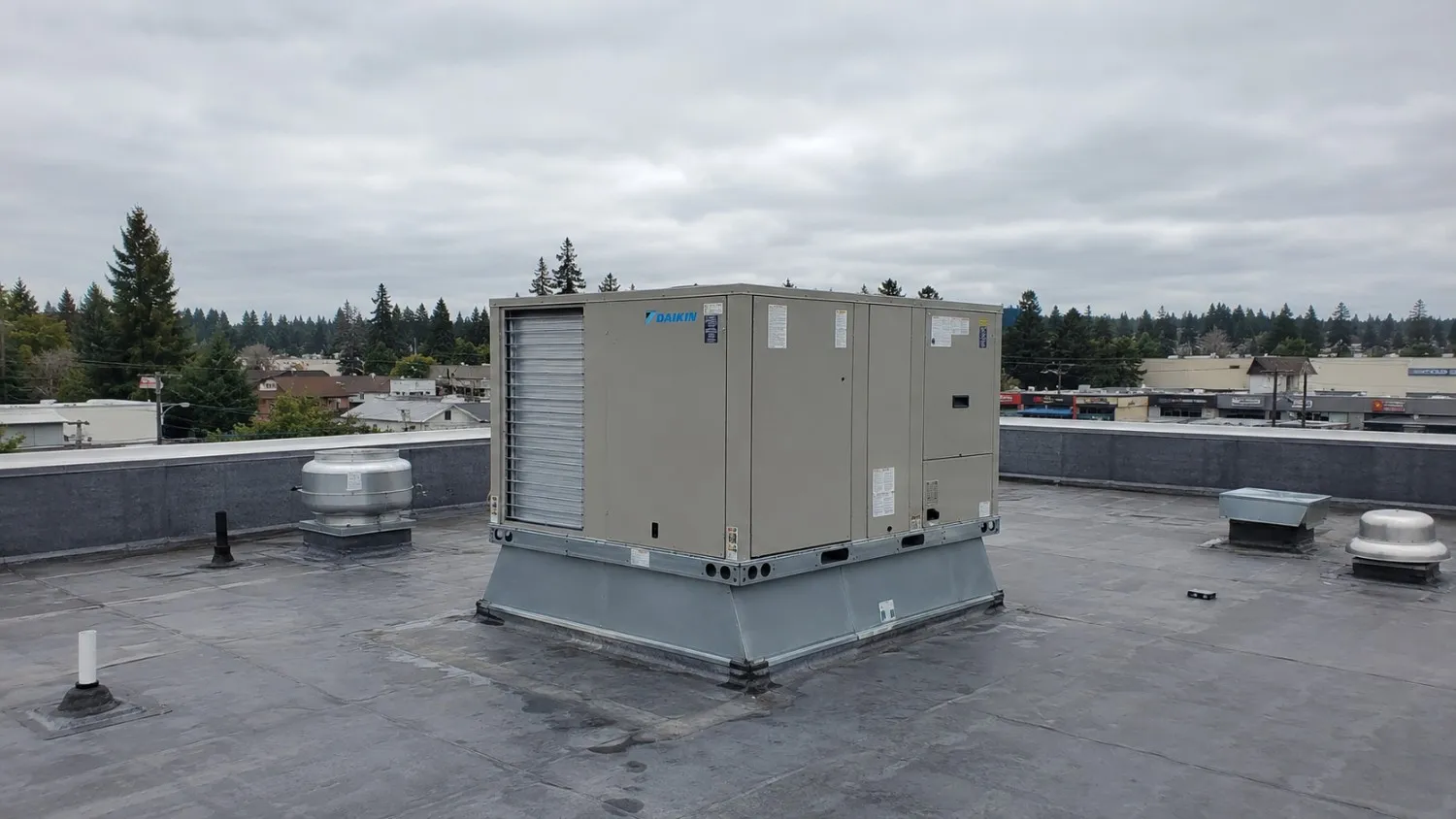 Daikin commercial rooftop packaged HVAC unit on a Pierce County, WA building