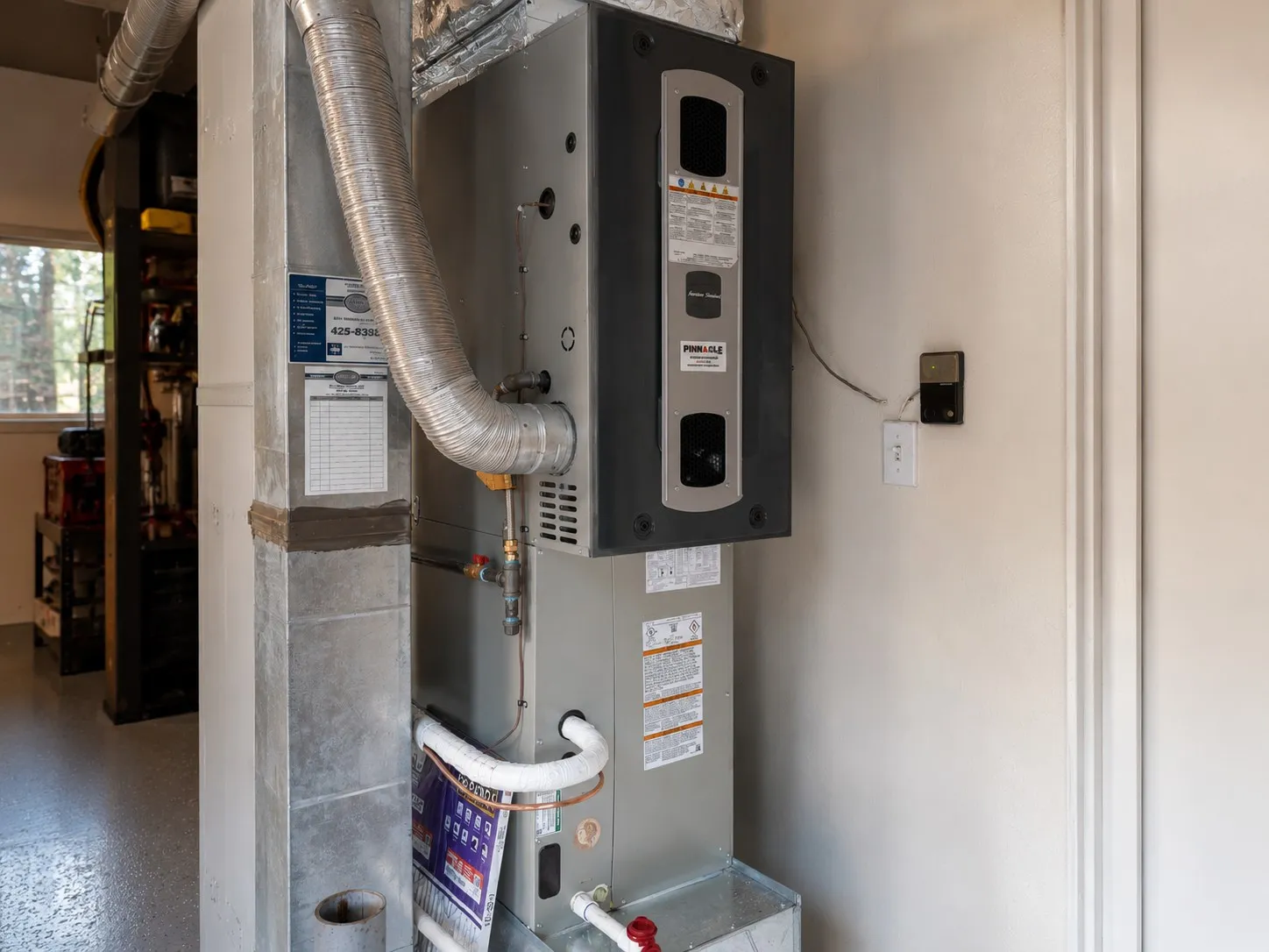 High-efficiency American Standard furnace installed by Pinnacle Air Control in a Pierce County, WA home