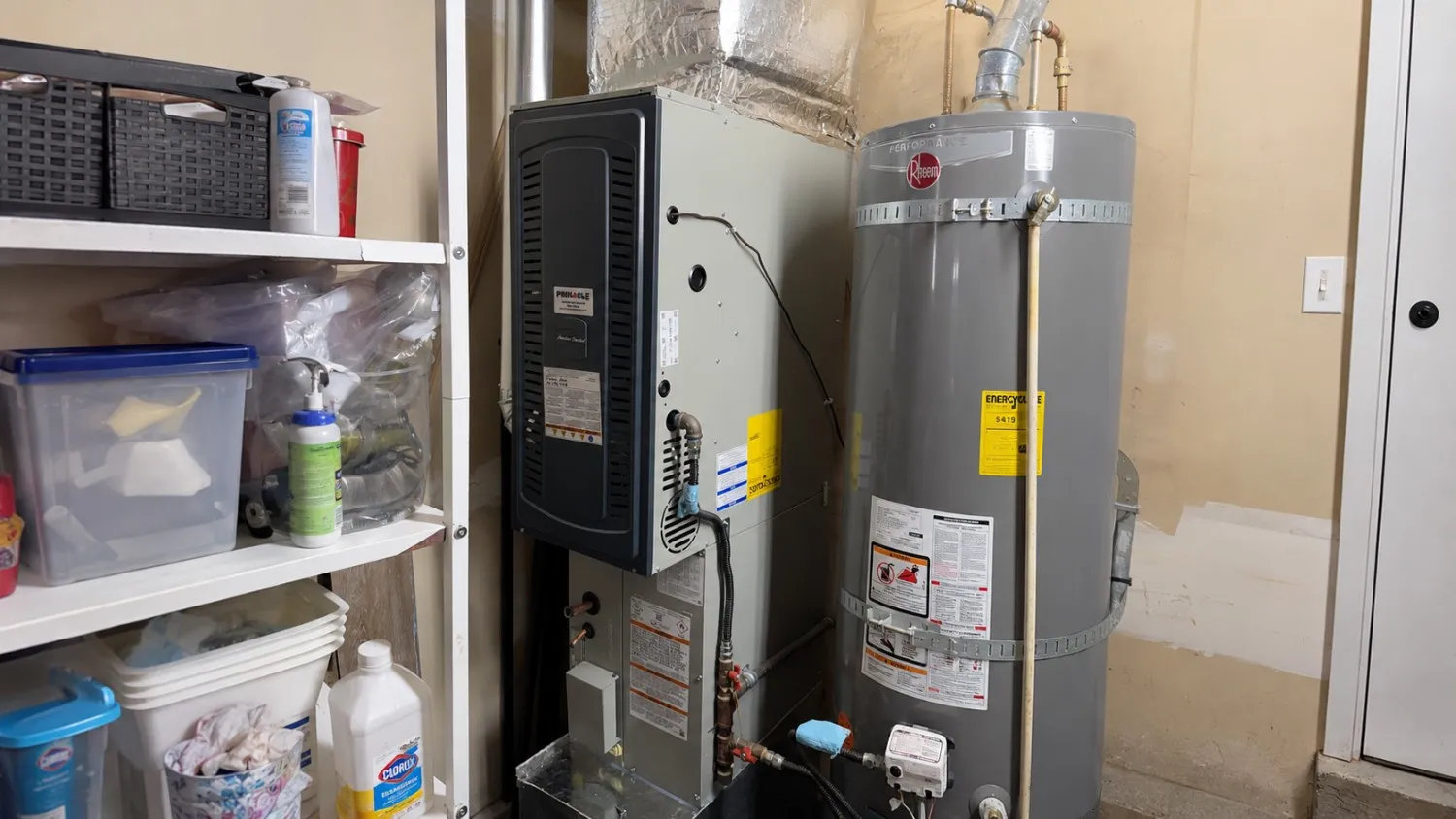 American Standard furnace and water heater serviced during a maintenance visit in a Pierce County, WA home