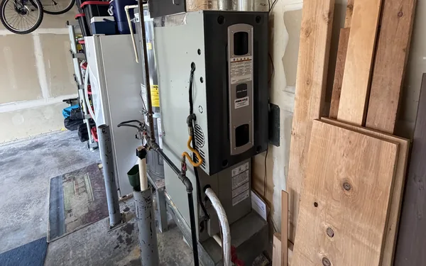 American Standard gas furnace with a Pinnacle Air Control label in a Pierce County, WA garage