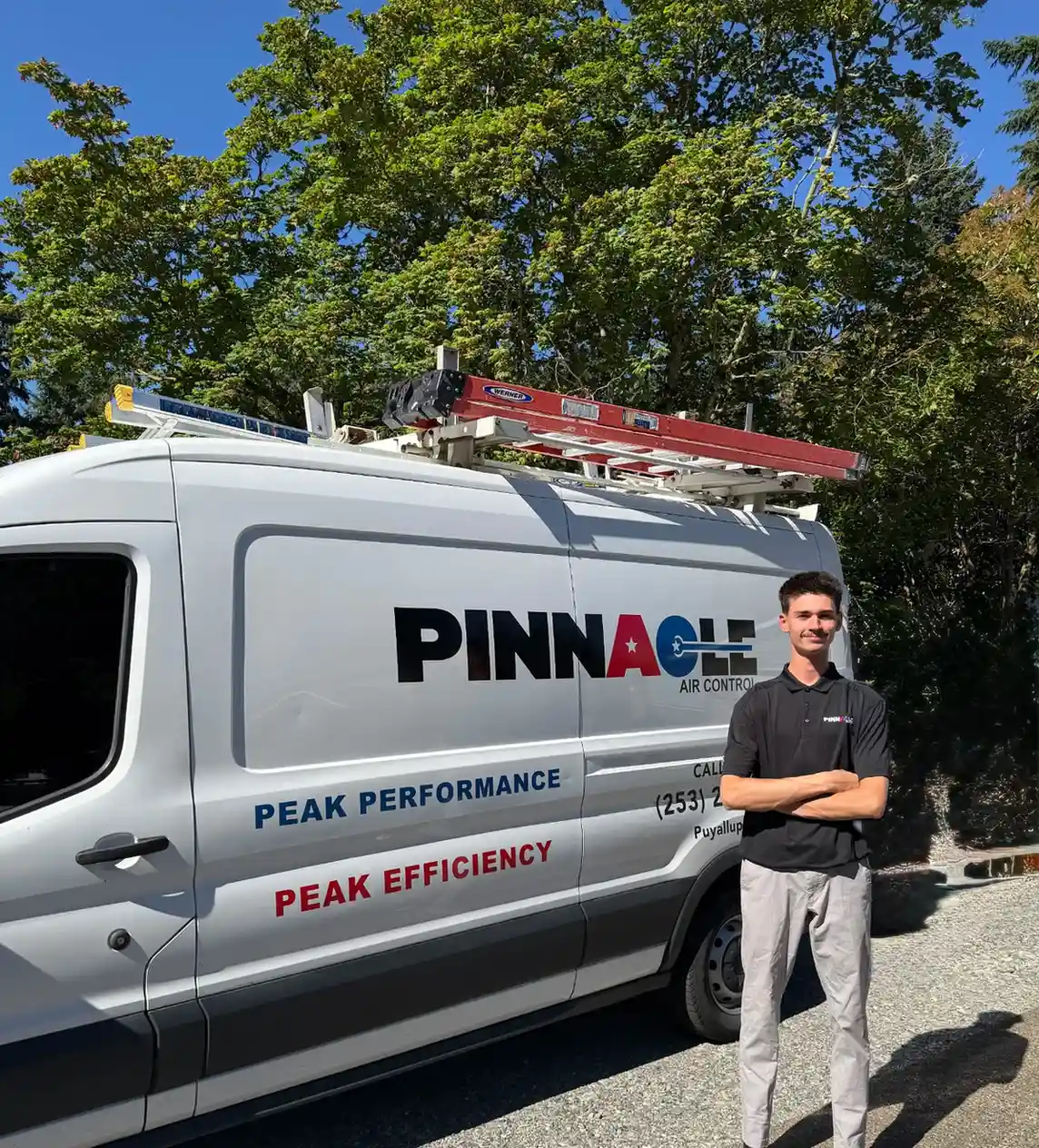 Pinnacle Air Control owner Dennis standing beside the company service van in Puyallup, Washington